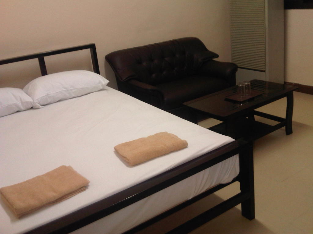 Lee House Inn Bangkok Quarto foto