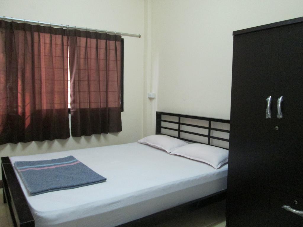 Lee House Inn Bangkok Quarto foto